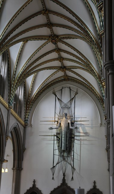 The nave at Blackburn Cathedral showing the Christ the Worker sculpture by John Hayward.