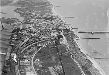 Aerial view of railway line weaving through the town