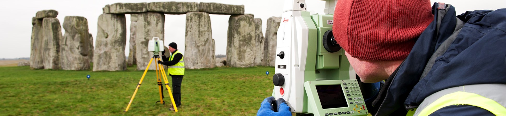 surveying standing stones at Stonehenge, Wilts