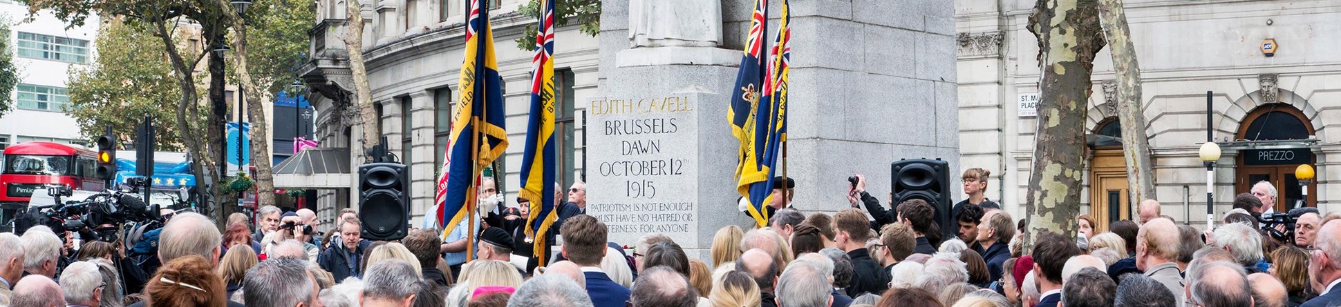 Photo of a crowd of people at Edith Cavell Memorial by Sir George Frampton