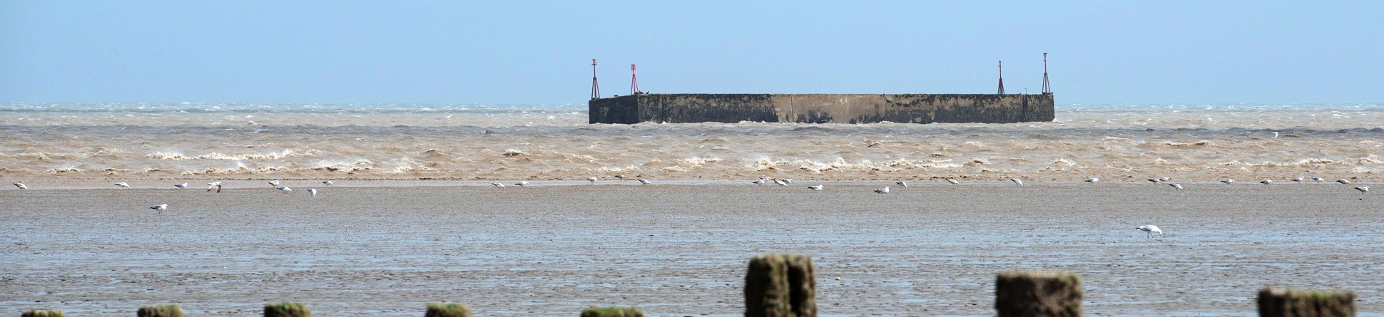 Phoenix Caisson off the coast of Littlestone-on-Sea, Kent. The huge concrete structure was part of the Mulberry Harbour plan to create landing stages in France to support the D-Day invasion.