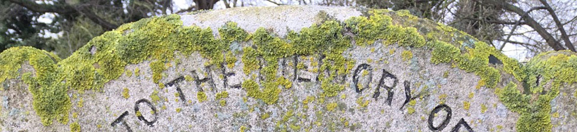 Flaming Heart Gravestone reads - To the memory of the 78 people who were burnt to death in a barn at Burwell on Sept 8th 1727, this stone was cleaned and this inscription engraved Sept 1910