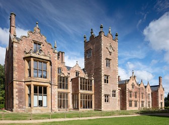 A medium-sized stately home built in red brick